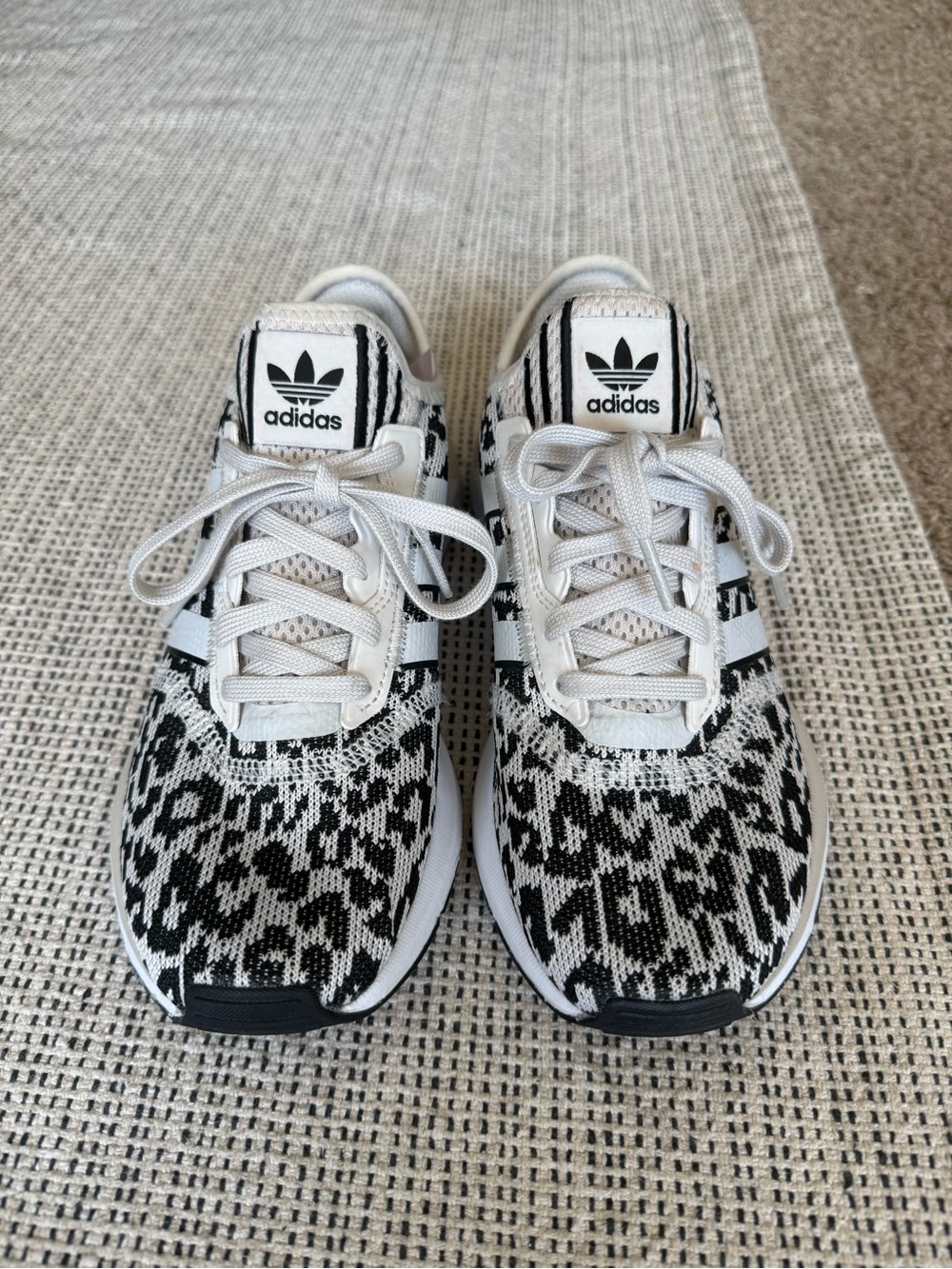 adidas Women’s Black & White Leopard Knit Sneakers